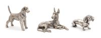 A Group of Three Pewter Dogs — 20TH CENTURY