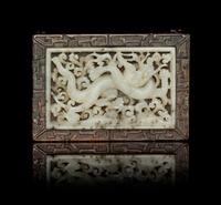 A White Jade Inset Hardwood Ink Rest Length 2 3/4 x width 1 3/4 inches.
