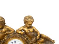 A Louis XV Style Gilt Bronze and Marble Mantel Clock