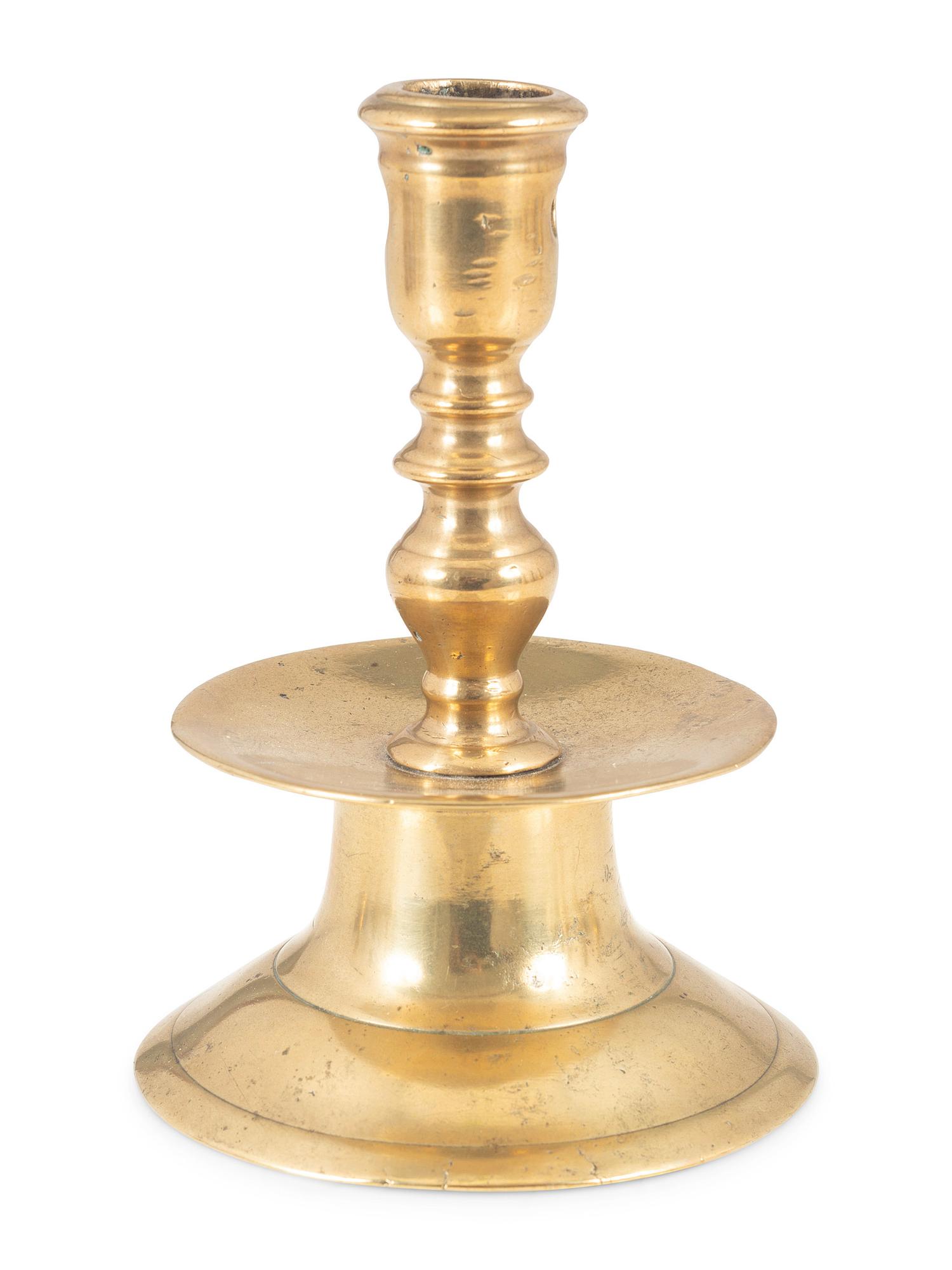 A Continental Brass Heemskirk Candlestick