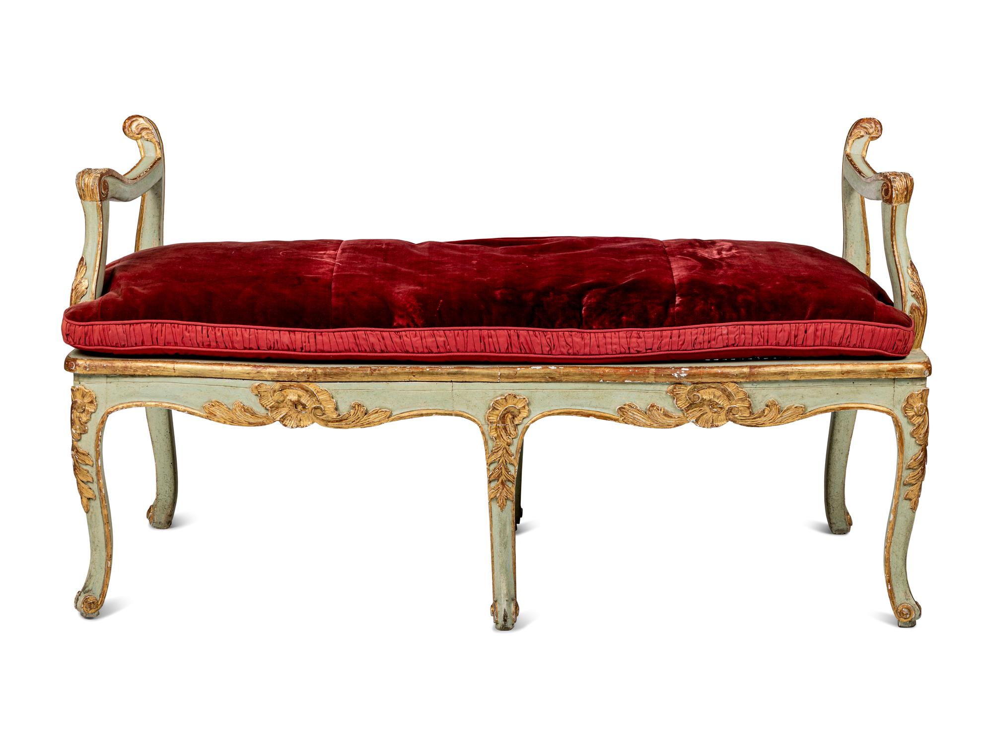 A Pair of Louis XV Green-Painted and Parcel-Gilt Cane Seat Window Benches