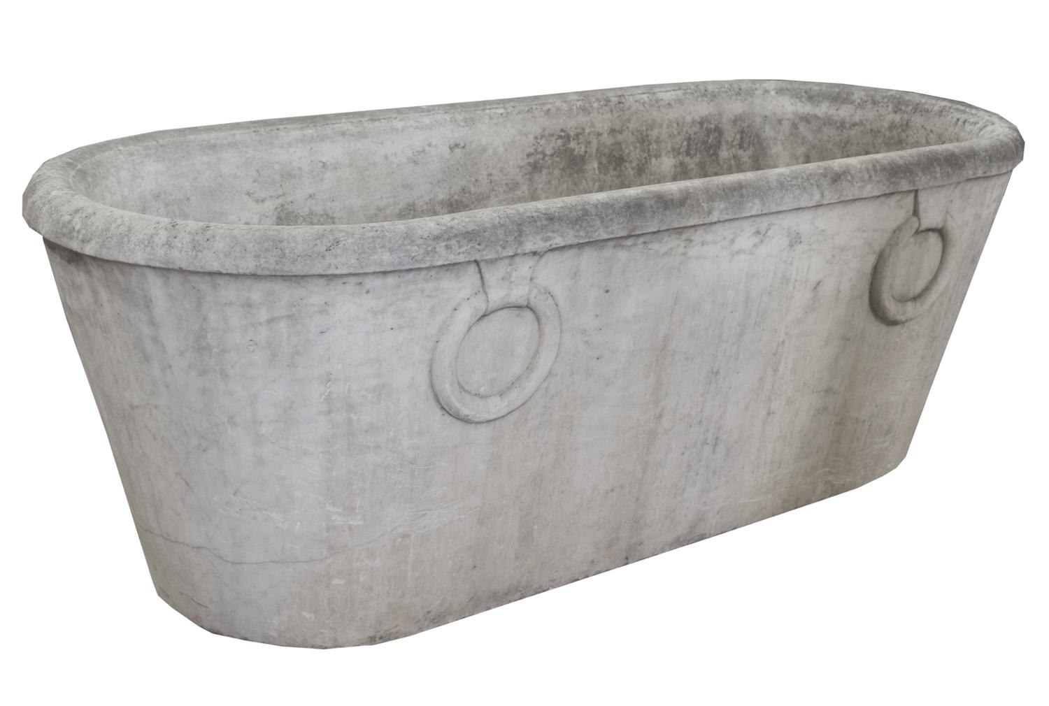 A Carved Marble Bathtub 65" W x 27" D x 23.5" H — Italy, 18th century