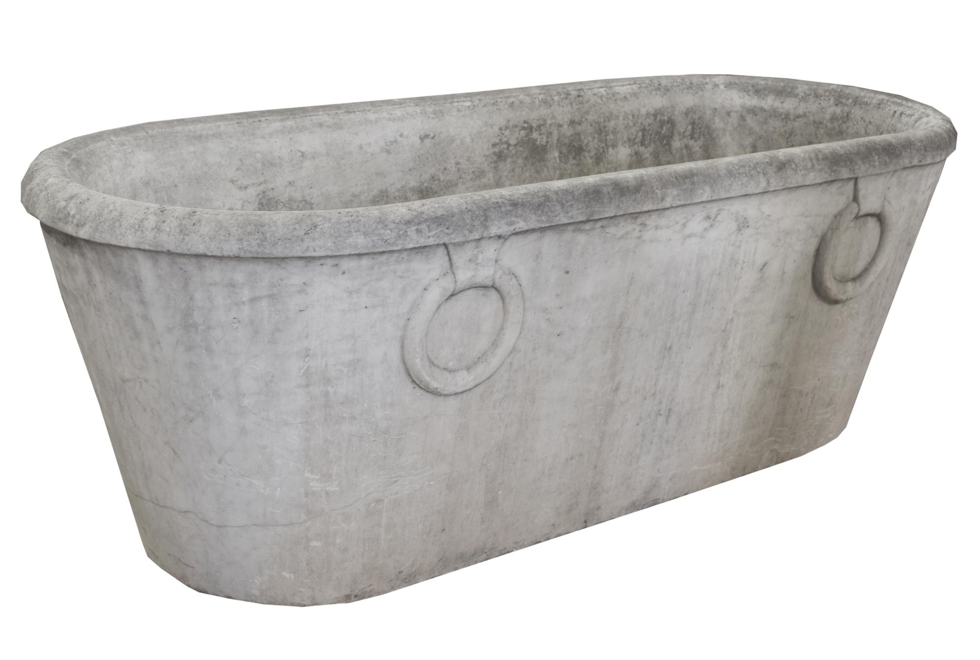 A Carved Marble Bathtub 65" W x 27" D x 23.5" H — Italy, 18th century