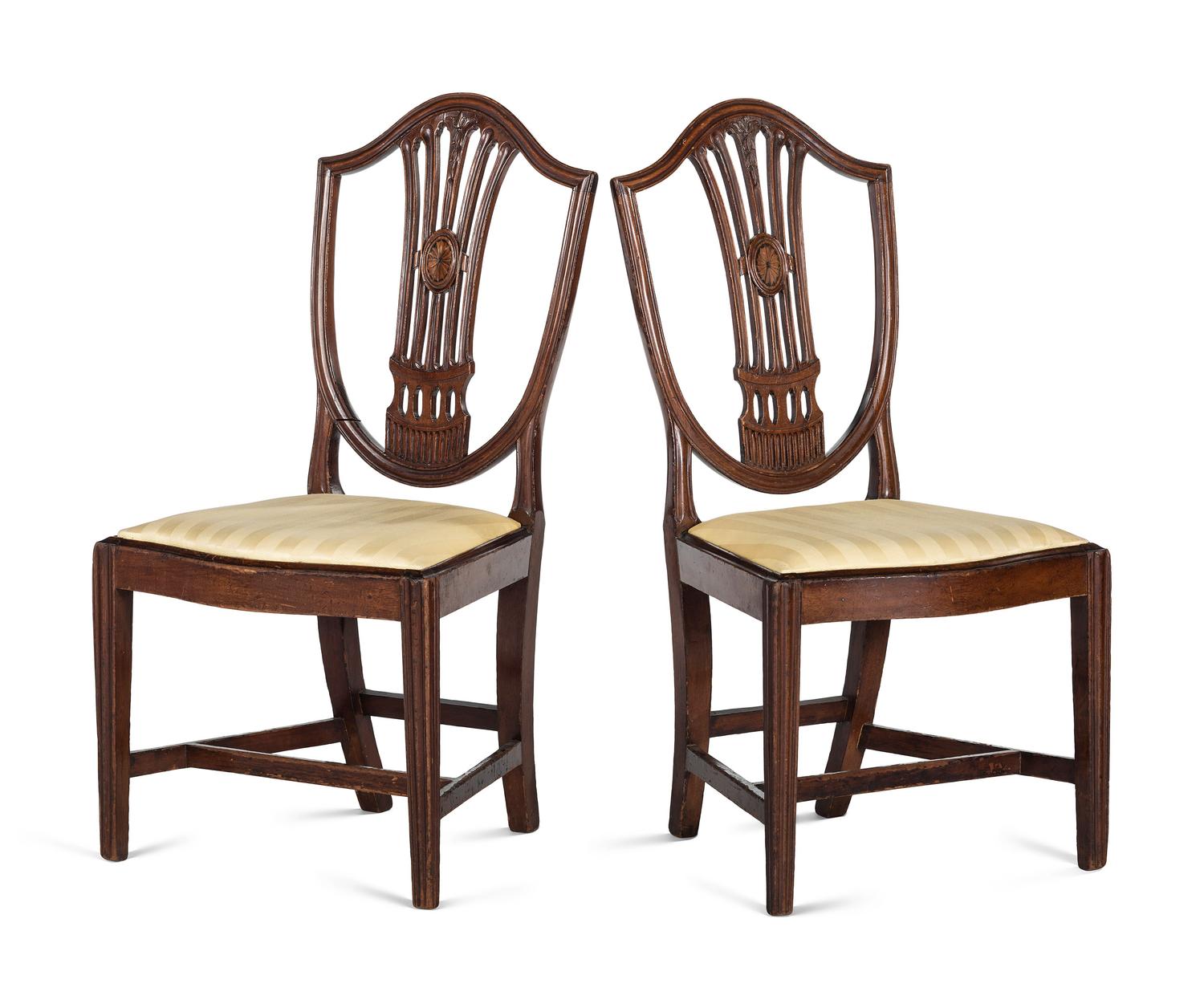 A Pair of Federal Carved and Inlaid Shield-Back Serpentine Front Side Chairs
