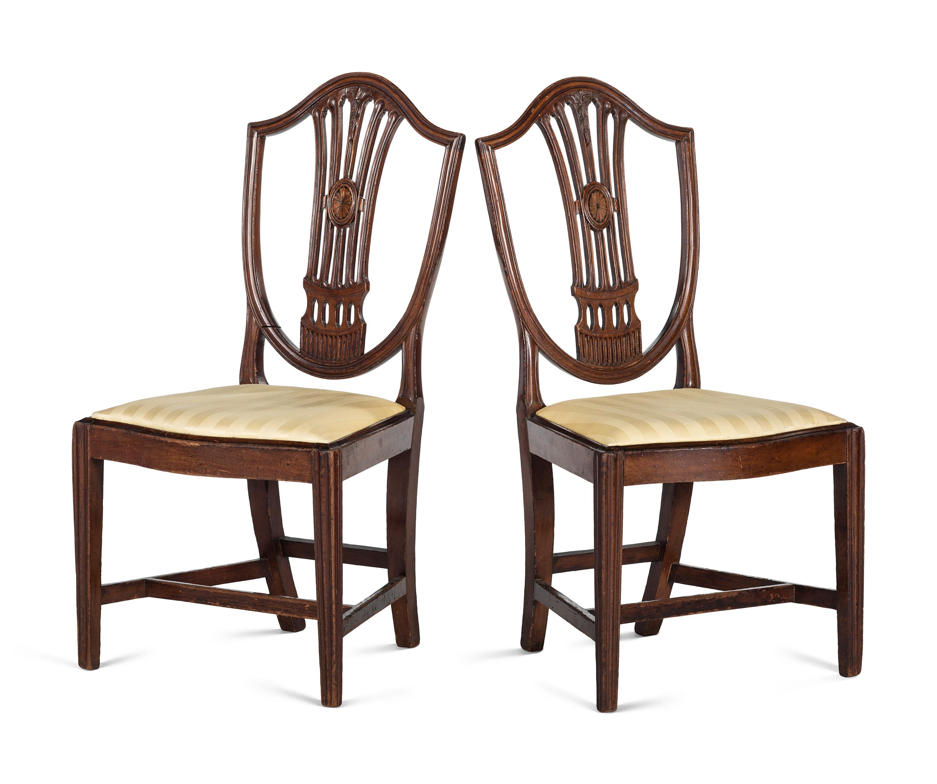 A Pair of Federal Carved and Inlaid Shield-Back Serpentine Front Side Chairs