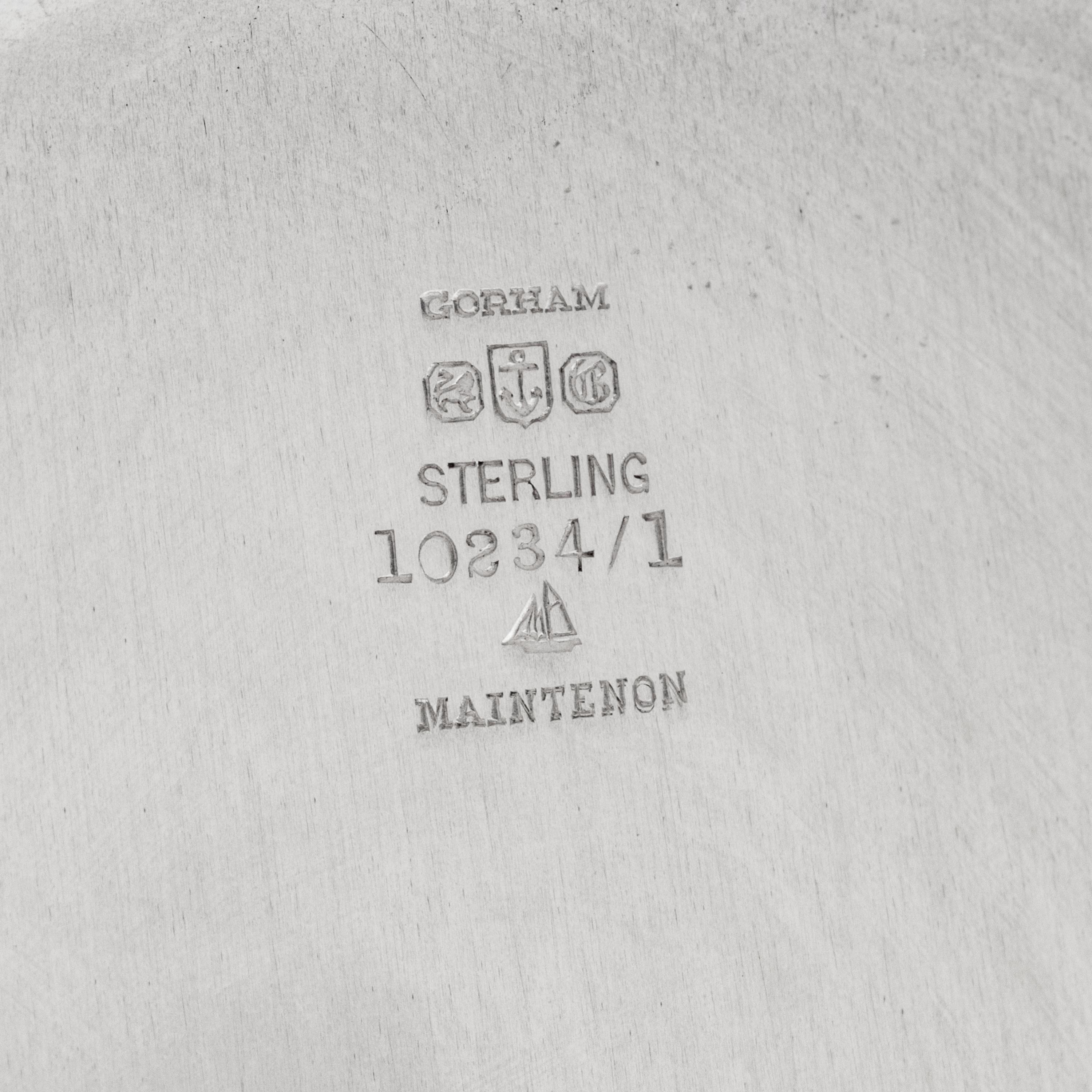 A Set of Twelve American Silver Dessert Plates