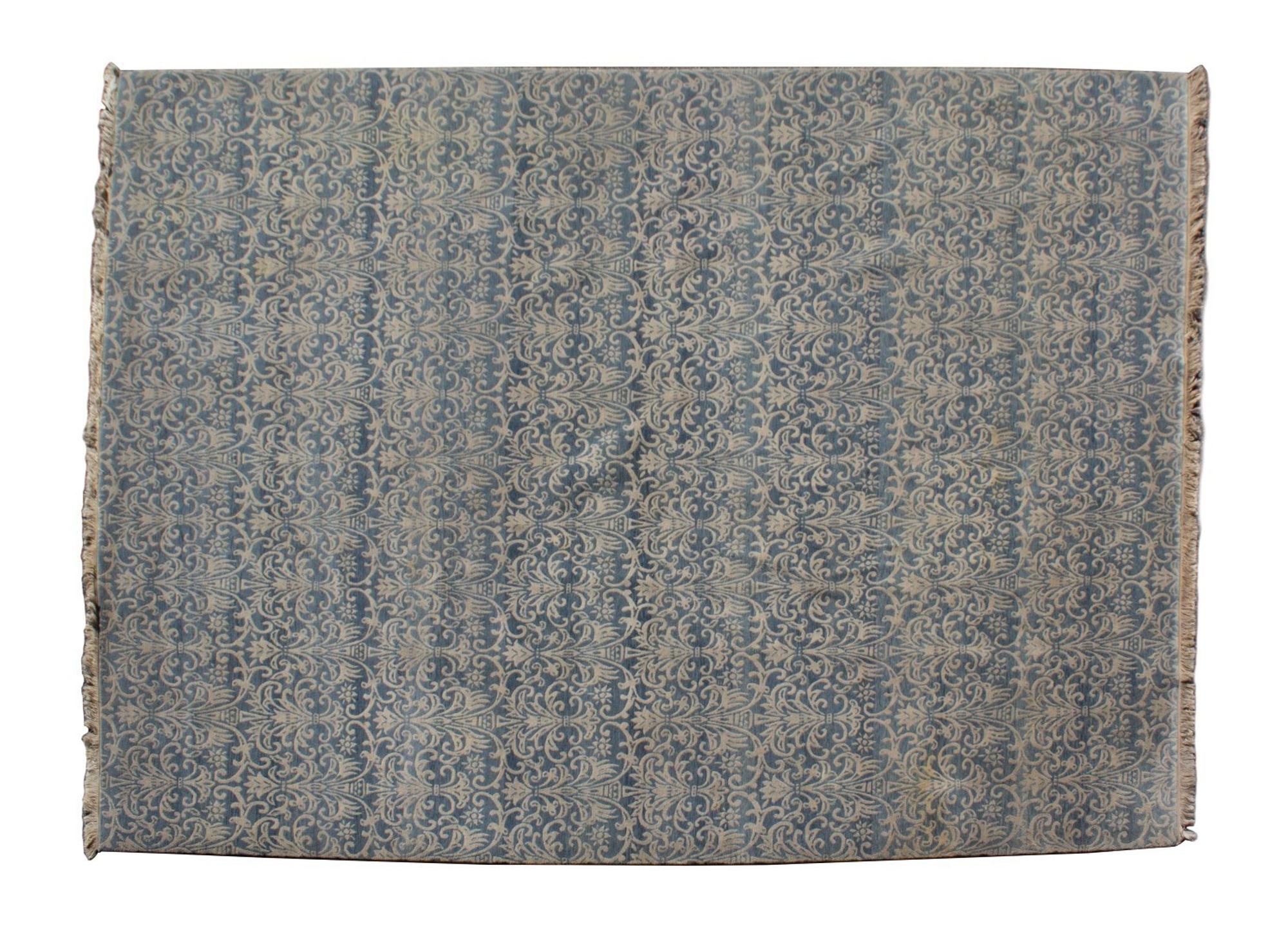 A Contemporary Blue and White Design Wool Rug — 20TH CENTURY