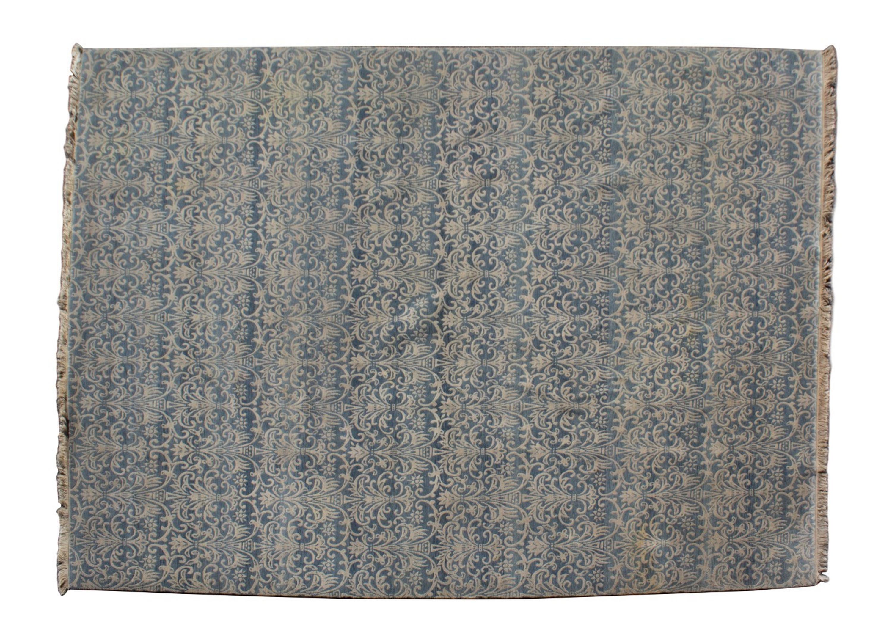A Contemporary Blue and White Design Wool Rug — 20TH CENTURY