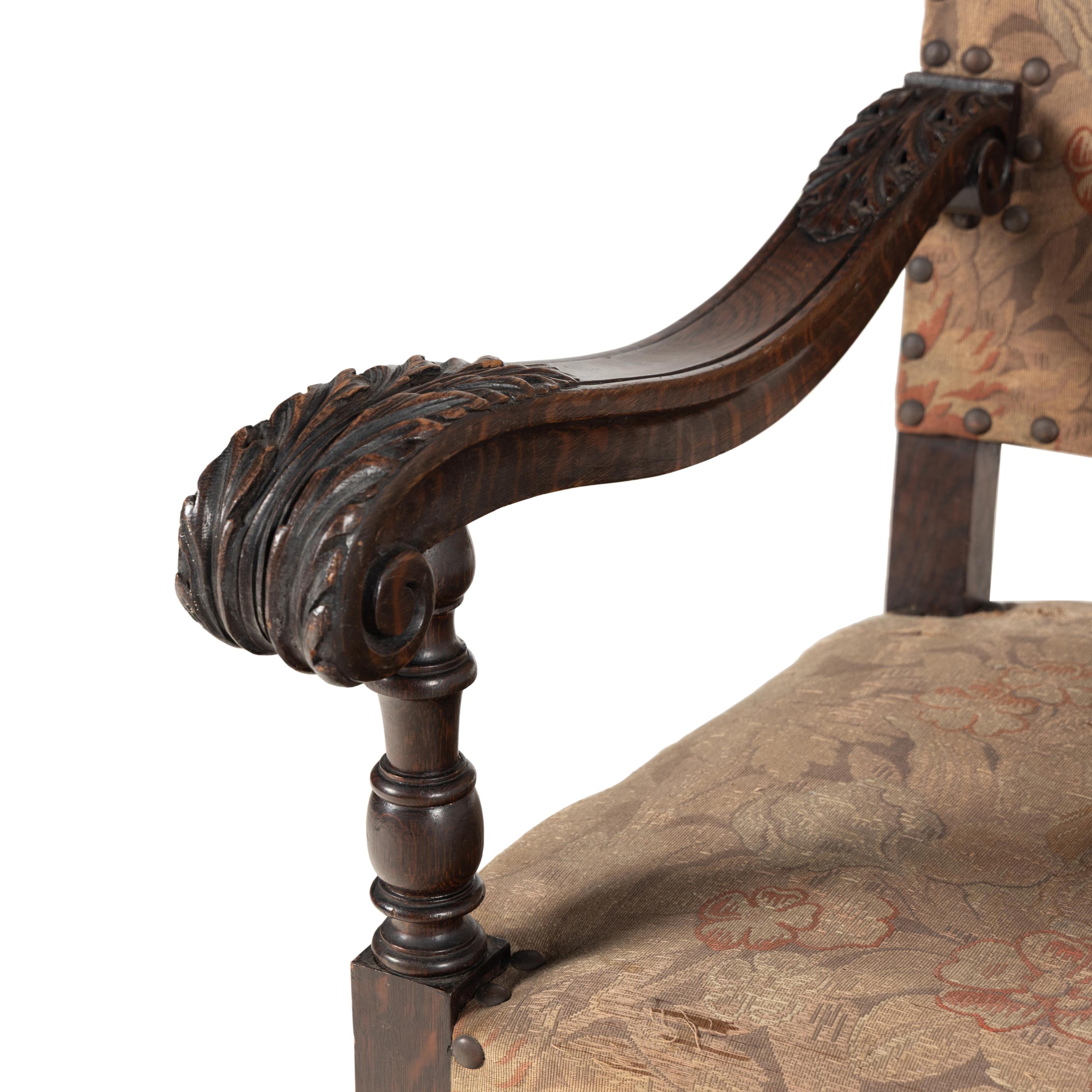A Henri II Style Carved Walnut Armchair