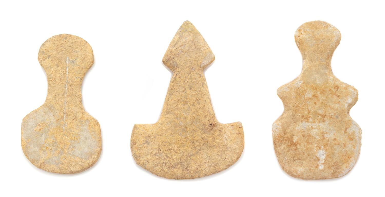 Three Anatolian Marble Idols Height of tallest 3 inches. — CIRCA MID-3RD MILLENNIUM B.C.E.