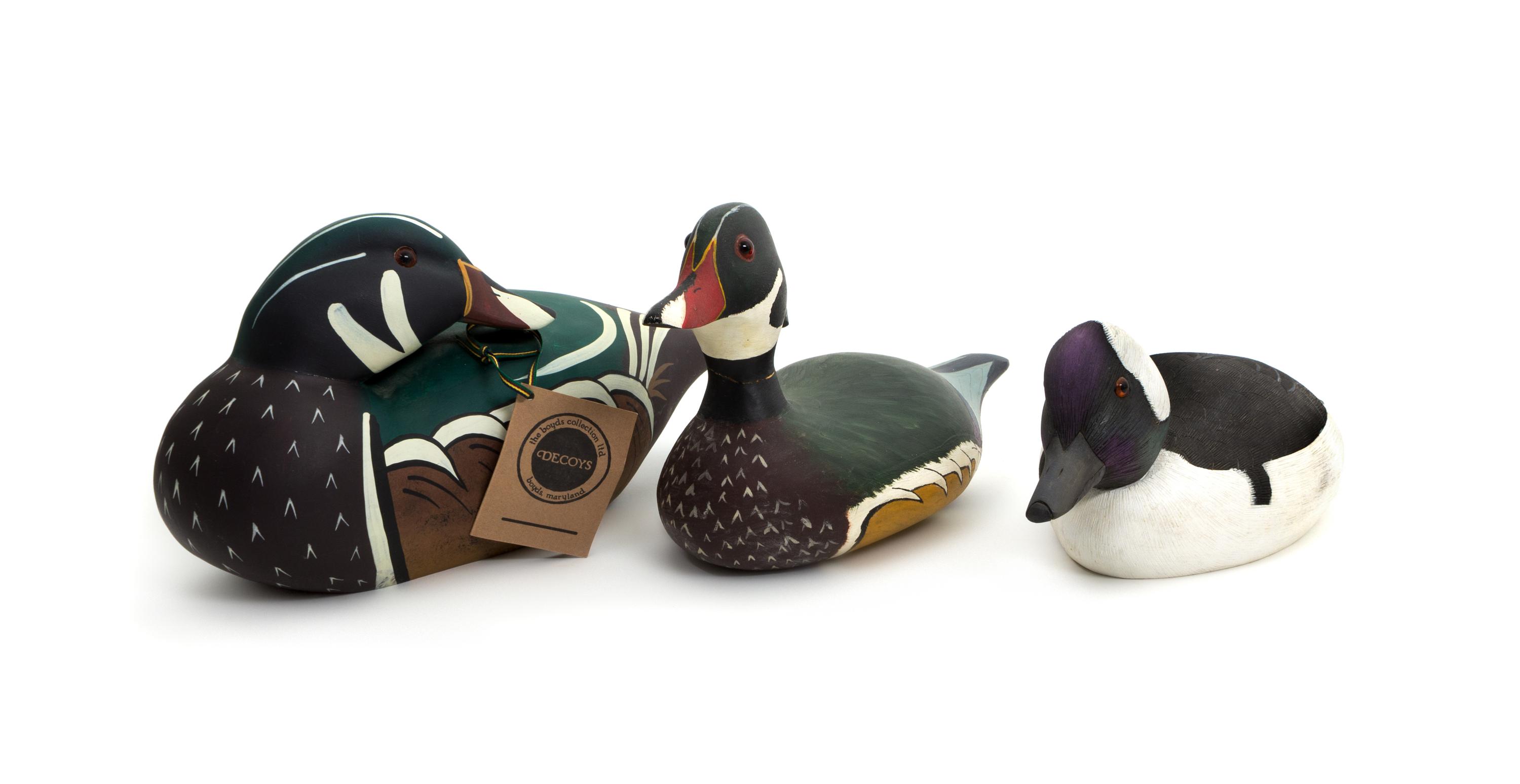 A Collection of Painted Wood Decoys Height of largest 6 x length 15 inches.