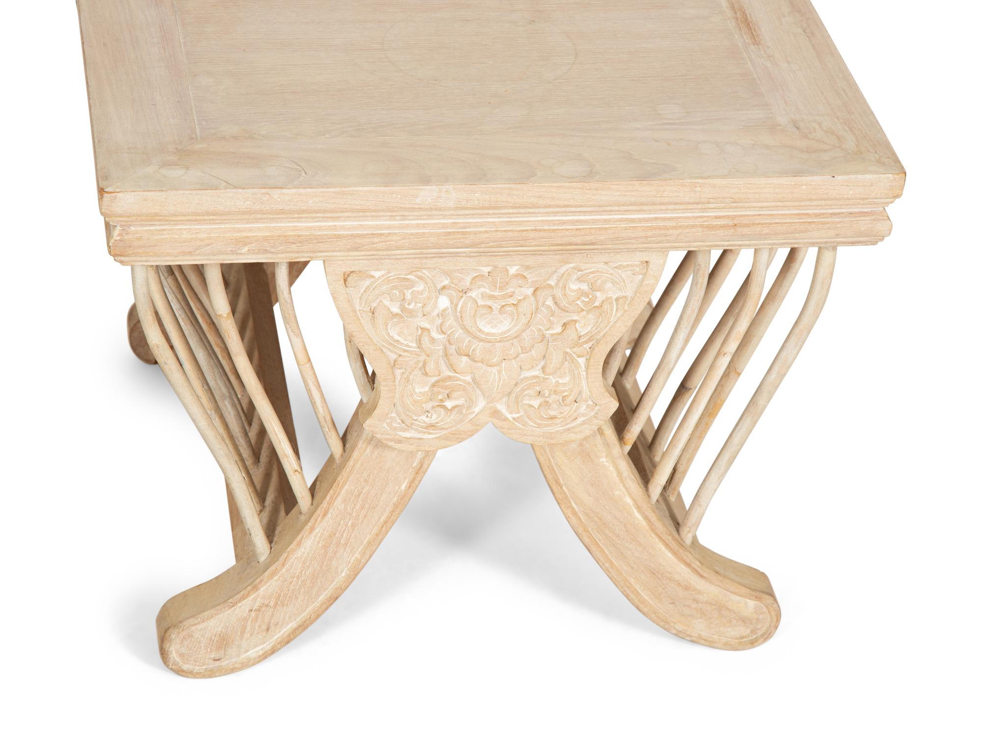 A Pair of Balinese Carved and Cerused Side Tables