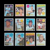 A Group of 12 1969 Topps Baseball Cards Featuring Multiple Hall of Famers and Notables (Including Nolan Ryan and Tom Seaver),