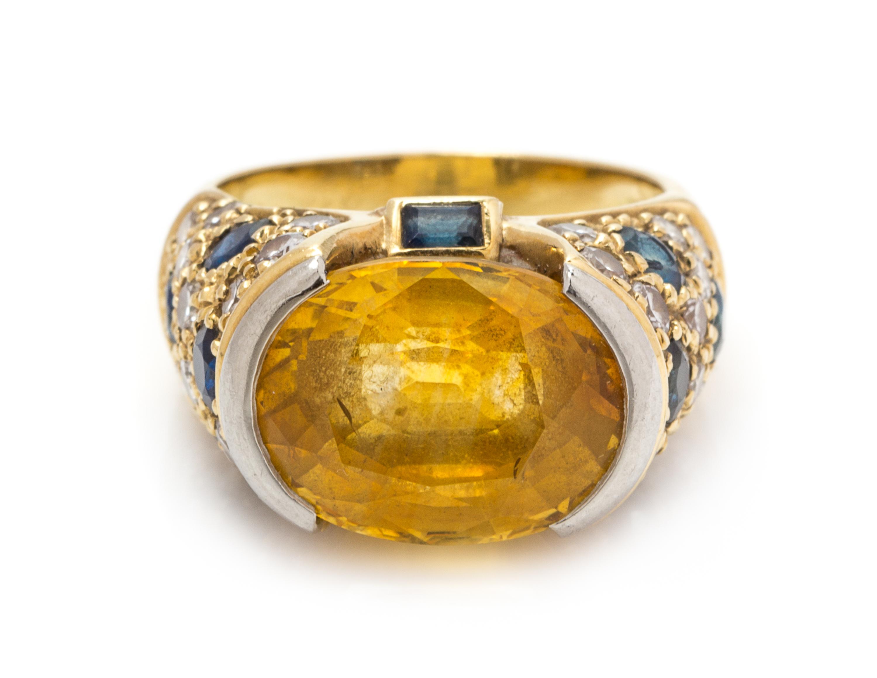 A Yellow Gold, Platinum, Yellow Sapphire, Sapphire and Diamond Ring, 6.00 dwts.