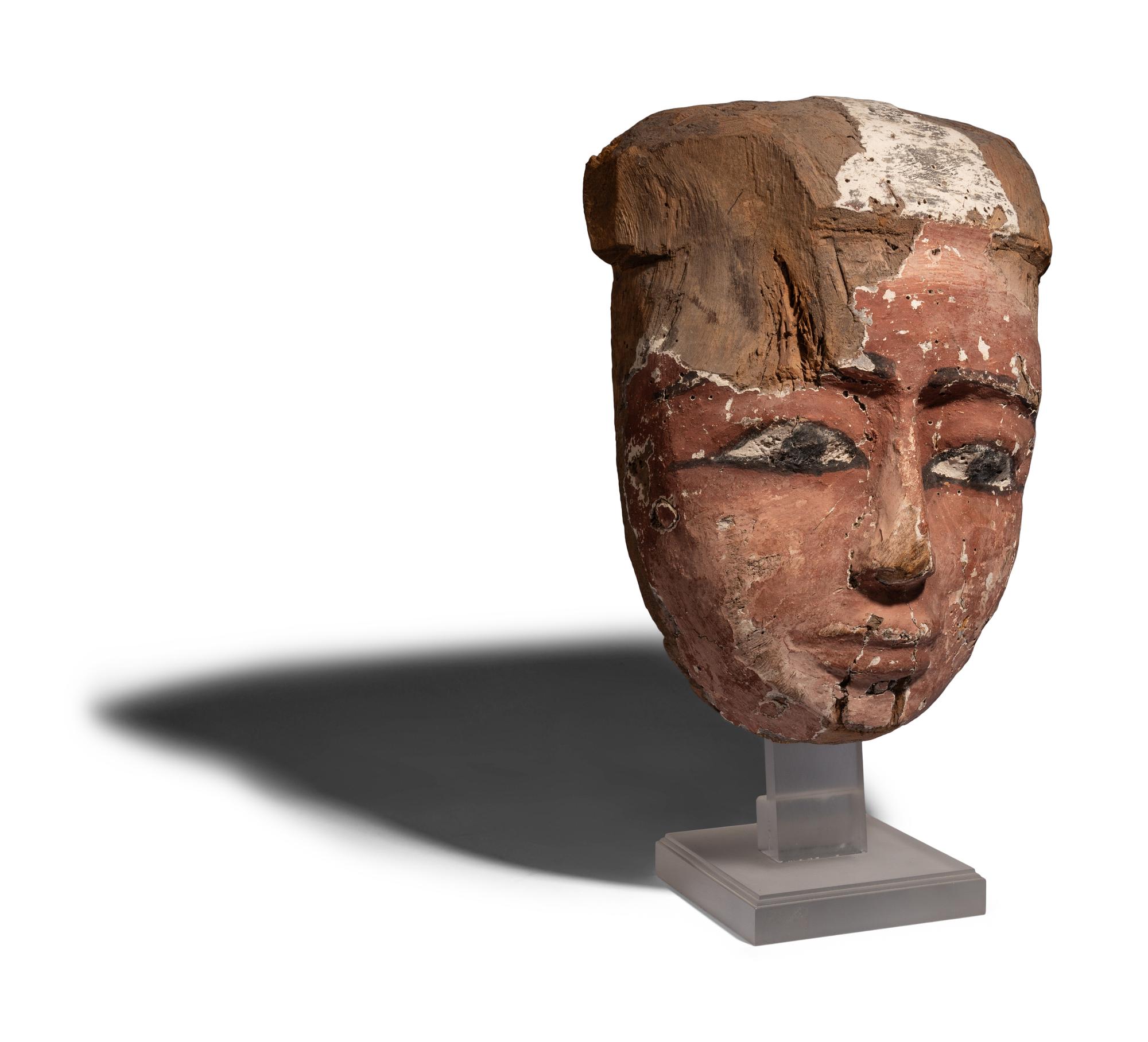 An Egyptian Painted Wood Mummy Mask