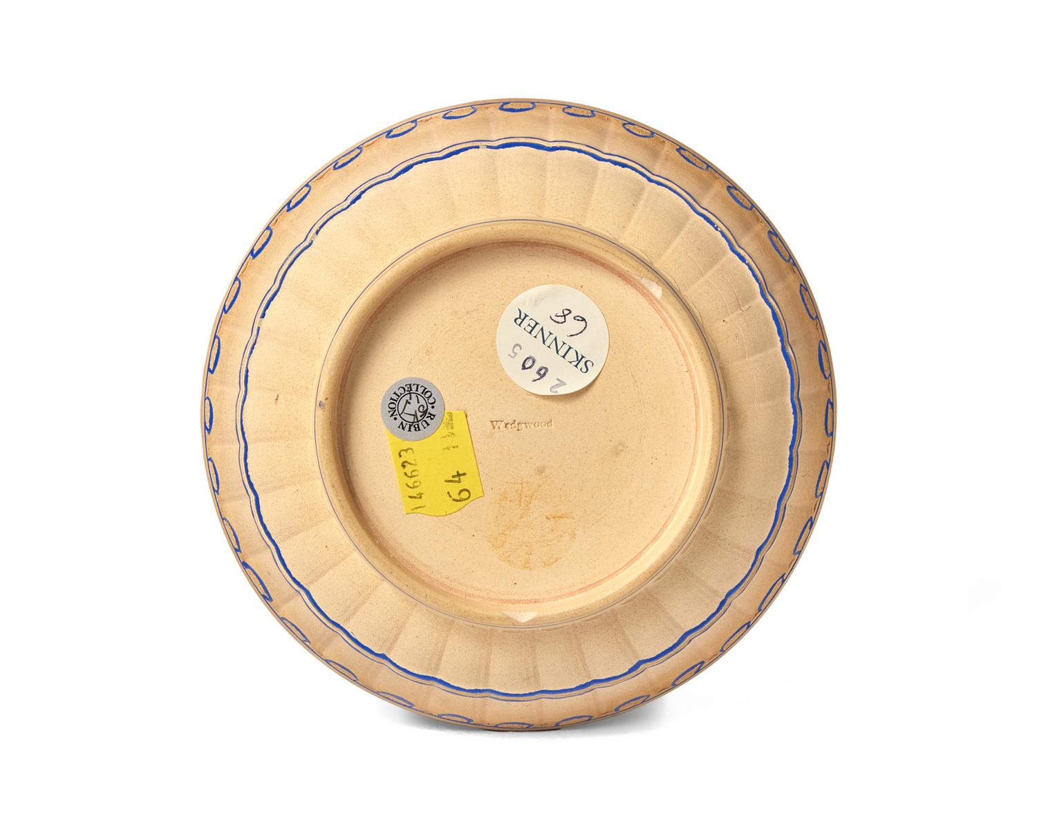 A Wedgwood Caneware Teacup and Saucer