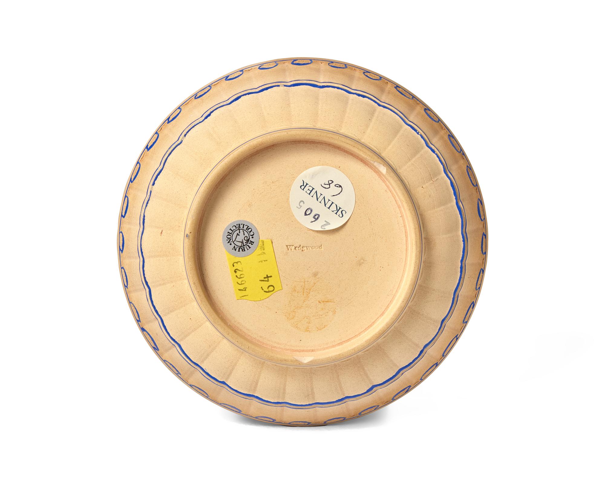 A Wedgwood Caneware Teacup and Saucer