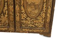 An English Black and Gilt Chinoiserie Decorated Cabinet with Interior Drawers