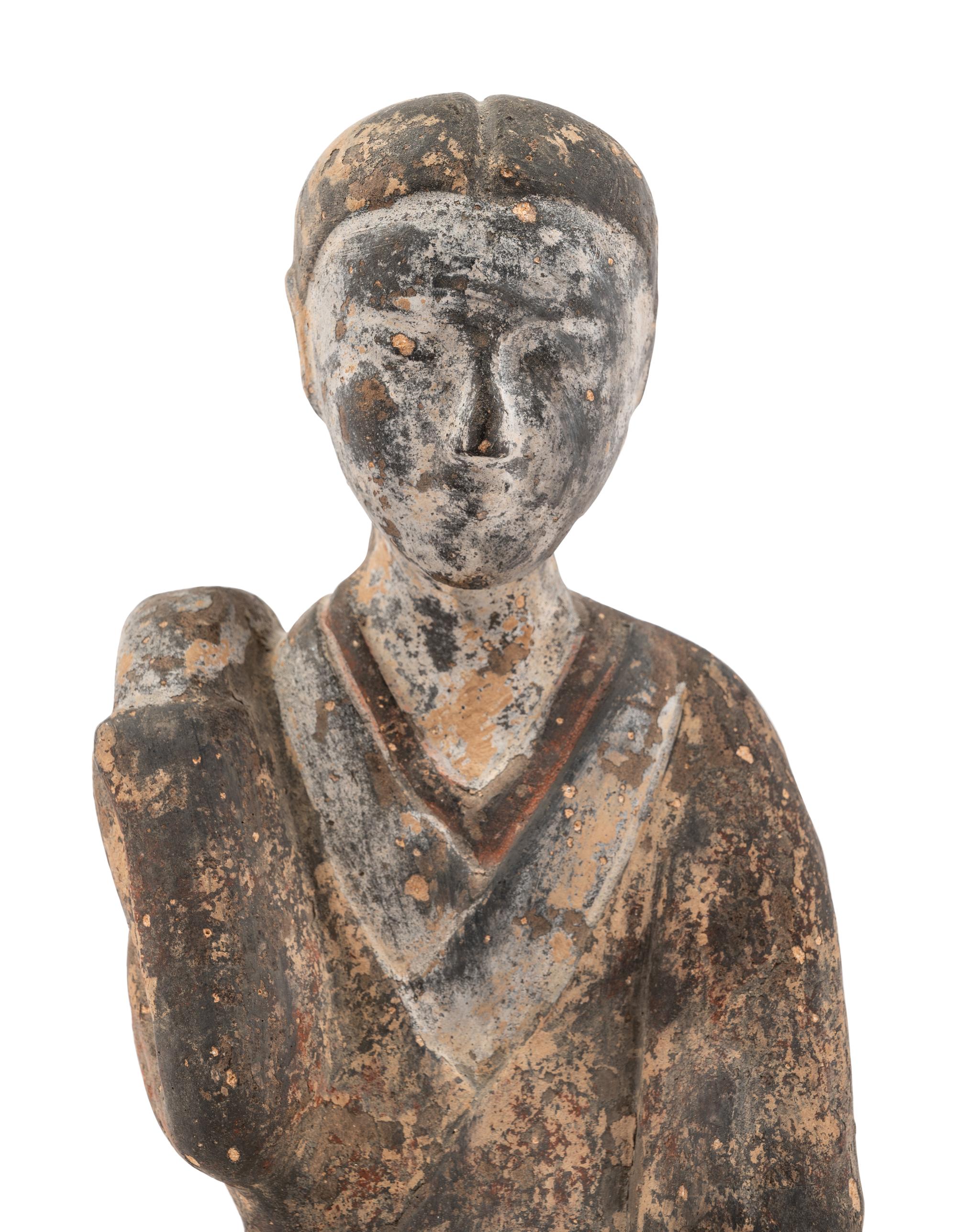 A Chinese Grey Pottery Figure of a Court Lady