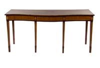 A Late George III Mahogany Console Table, IN THE MANNER OF GEORGE HEPPLEWHITE, Height 33 x width 73 x depth 29 inches. — IN THE MANNER OF GEORGE HEPPLEWHITE,