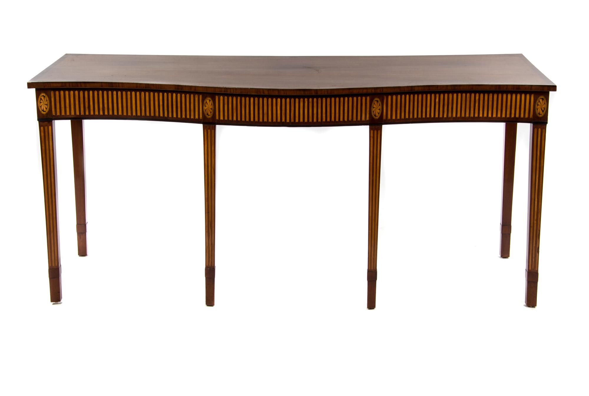A Late George III Mahogany Console Table, IN THE MANNER OF GEORGE HEPPLEWHITE, Height 33 x width 73 x depth 29 inches. — IN THE MANNER OF GEORGE HEPPLEWHITE,