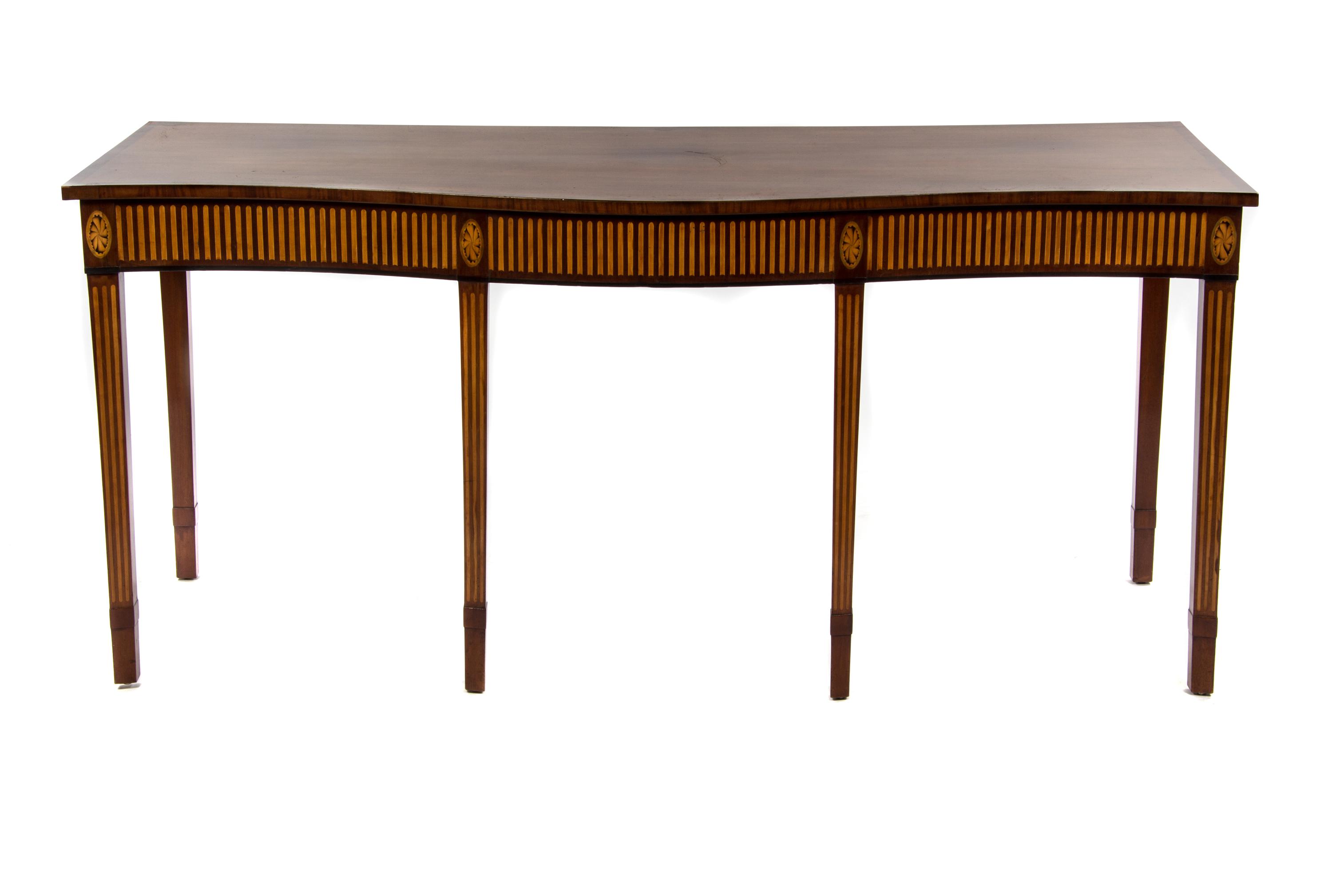 A Late George III Mahogany Console Table, IN THE MANNER OF GEORGE HEPPLEWHITE, Height 33 x width 73 x depth 29 inches. — IN THE MANNER OF GEORGE HEPPLEWHITE,