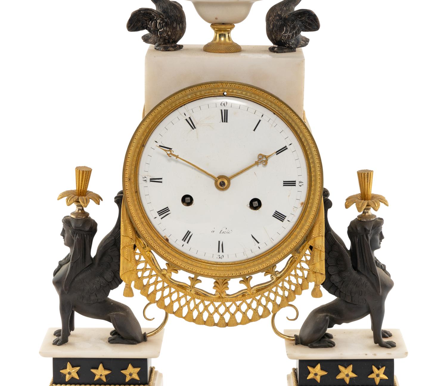 A Directoire Ormolu Mounted White Marble Clock