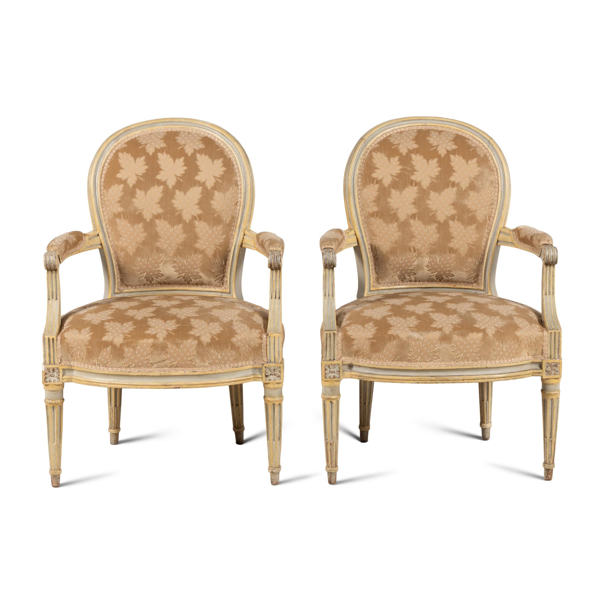 A Pair of Louis XVI Painted Fauteuils