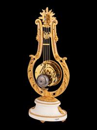 A French Gilt Bronze and Marble Lyre-Form Clock, Bourdier