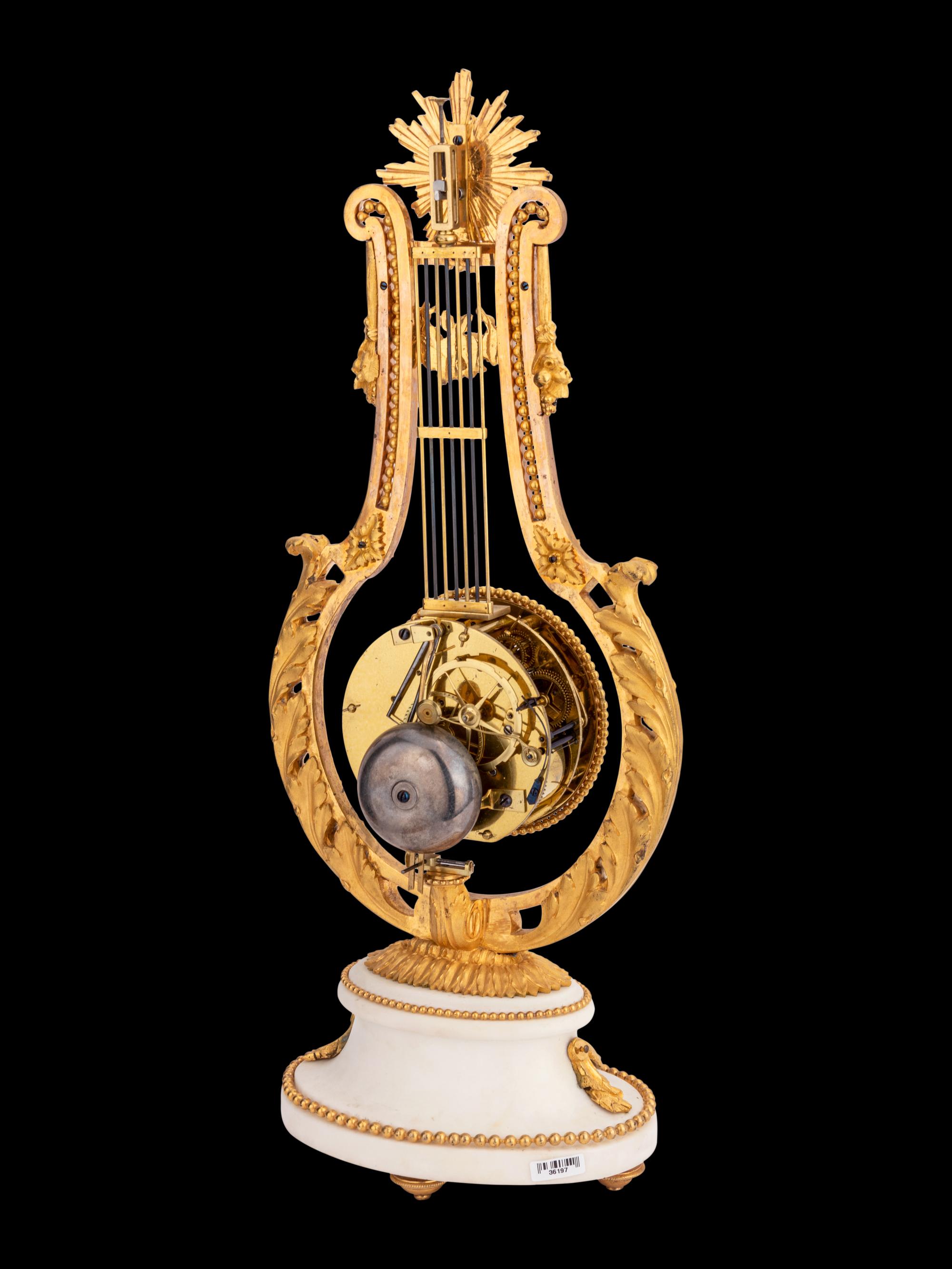 A French Gilt Bronze and Marble Lyre-Form Clock, Bourdier