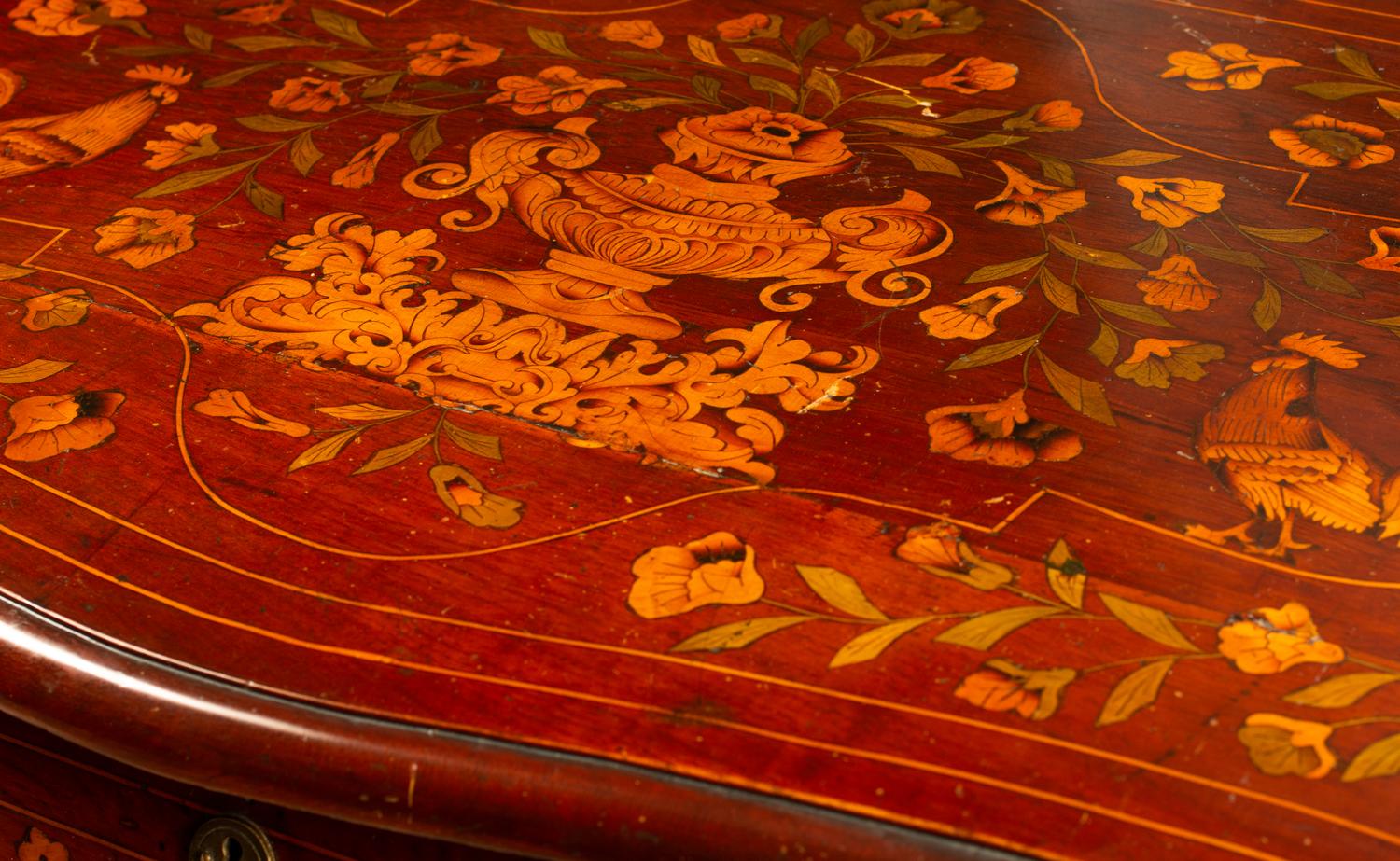 A Dutch Marquetry Inlaid Chest of Drawers — 19TH CENTURY