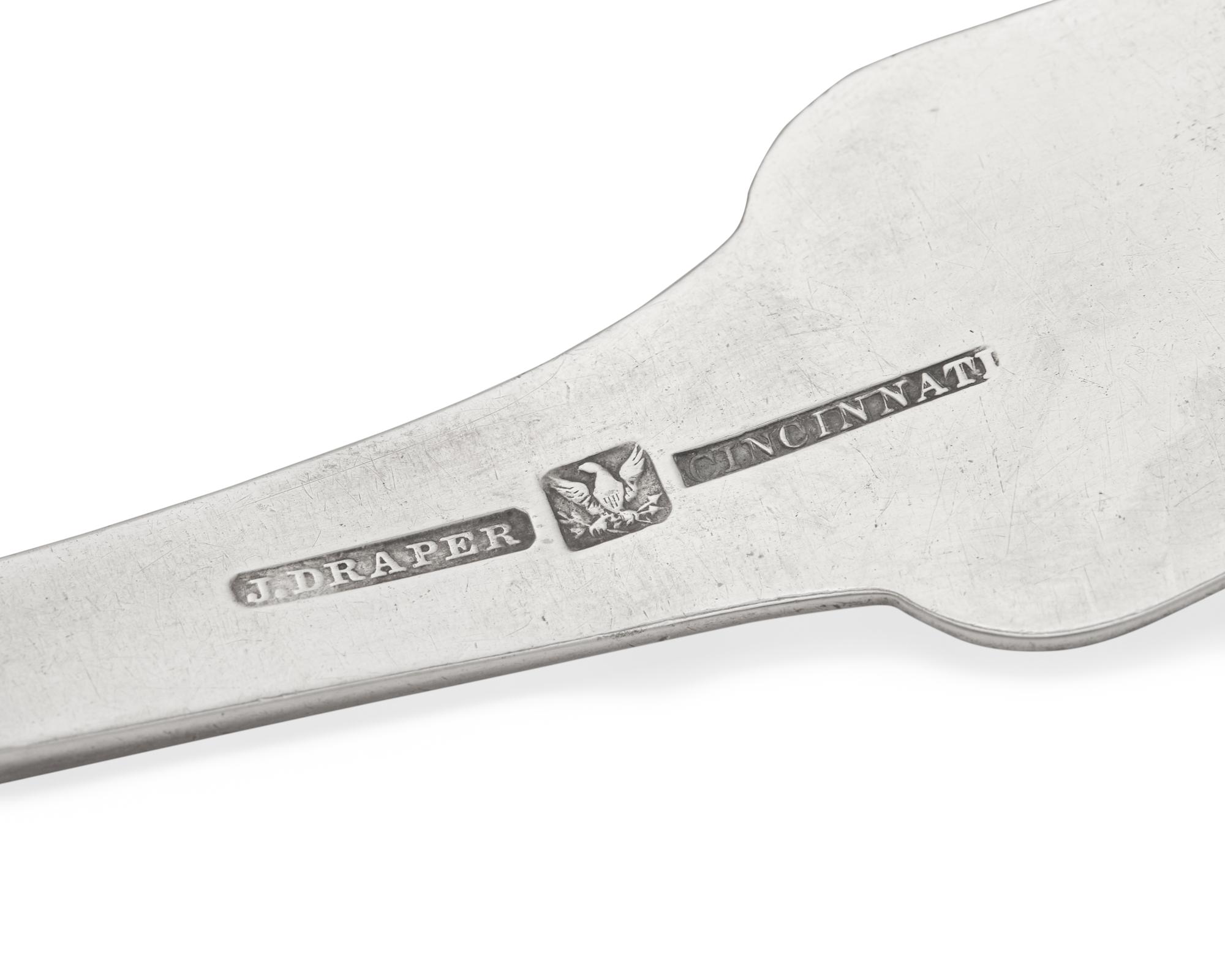 A Silver Punch Ladle and Two Silver Sugar Tongs