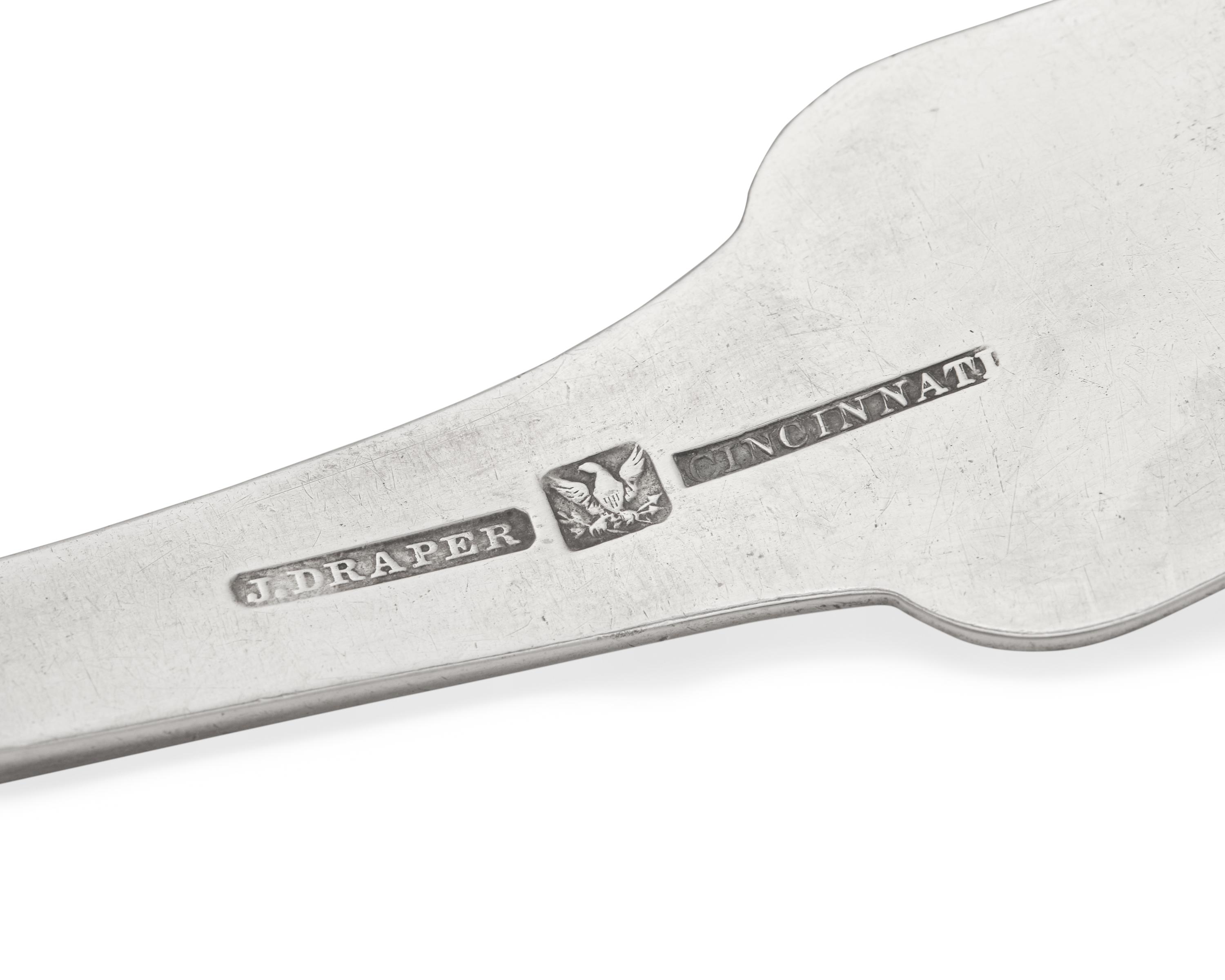 A Silver Punch Ladle and Two Silver Sugar Tongs