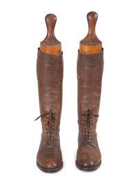 A Pair of Leather Lace Up Pull-On Men's Boots with Wood Boot Stretchers