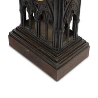 A French Patinated and Parcel Gilt Bronze Cathedral-Form Clock