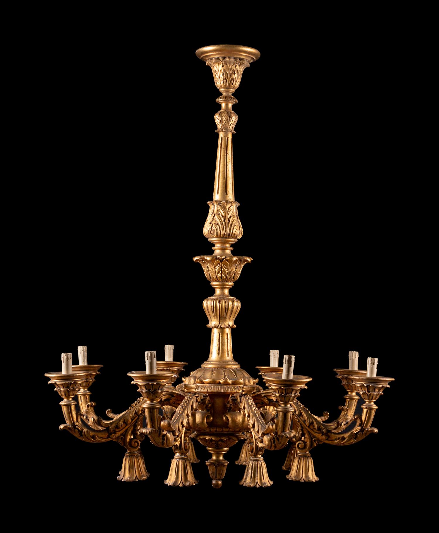 An Italian Rococo Style Giltwood Sixteen-Light Chandelier