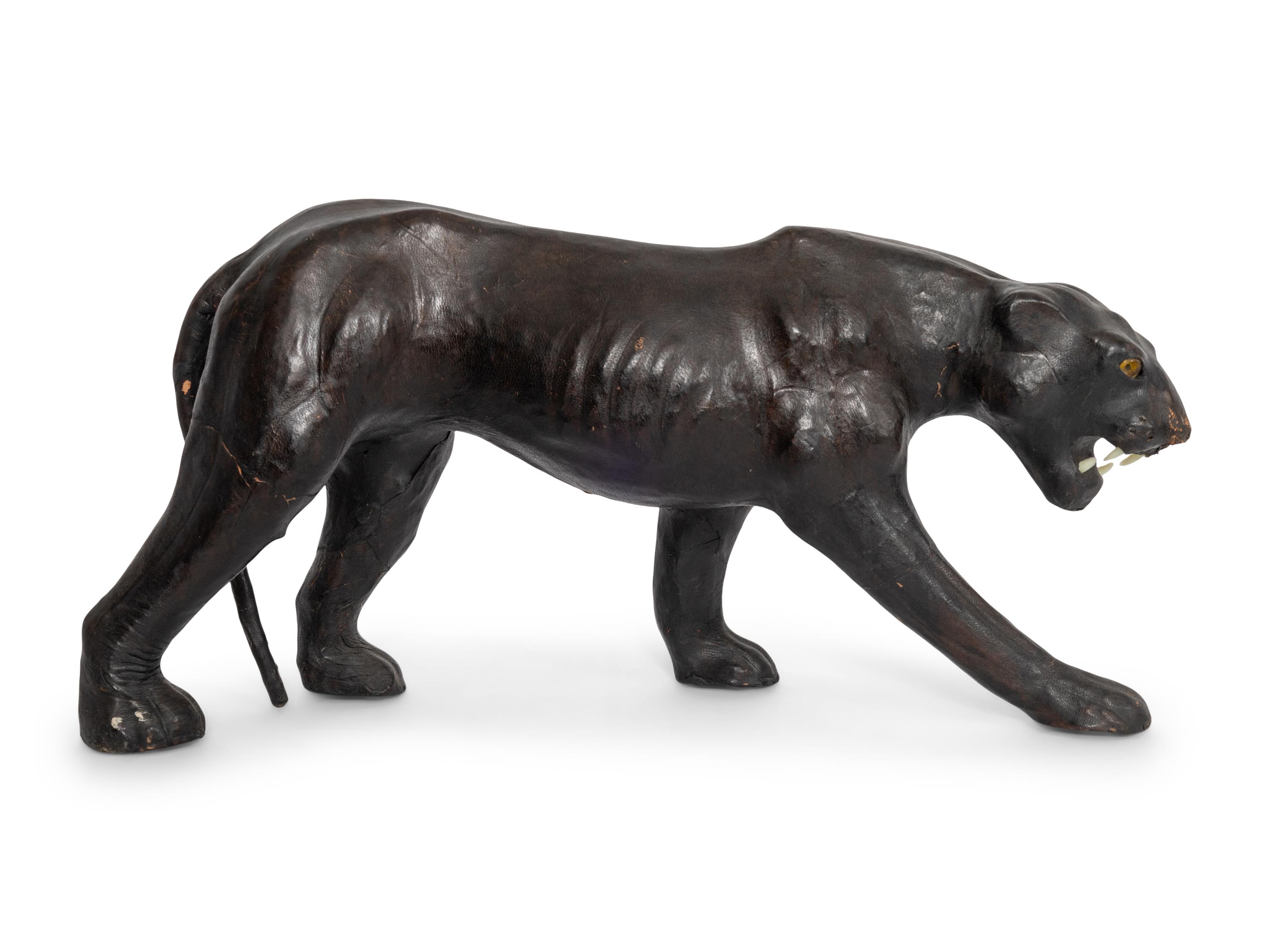 Two Leather Clad Animal Figures