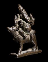 An Indian Bronze Figure of Ganesha Mounted