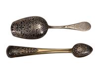 A Russian Niello Inlaid Silver Four-Piece Serving Set