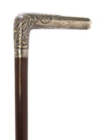 A French Art Nouveau Silver Handled Cane, Length of handle 4 x length overall 35 1/2 inches.