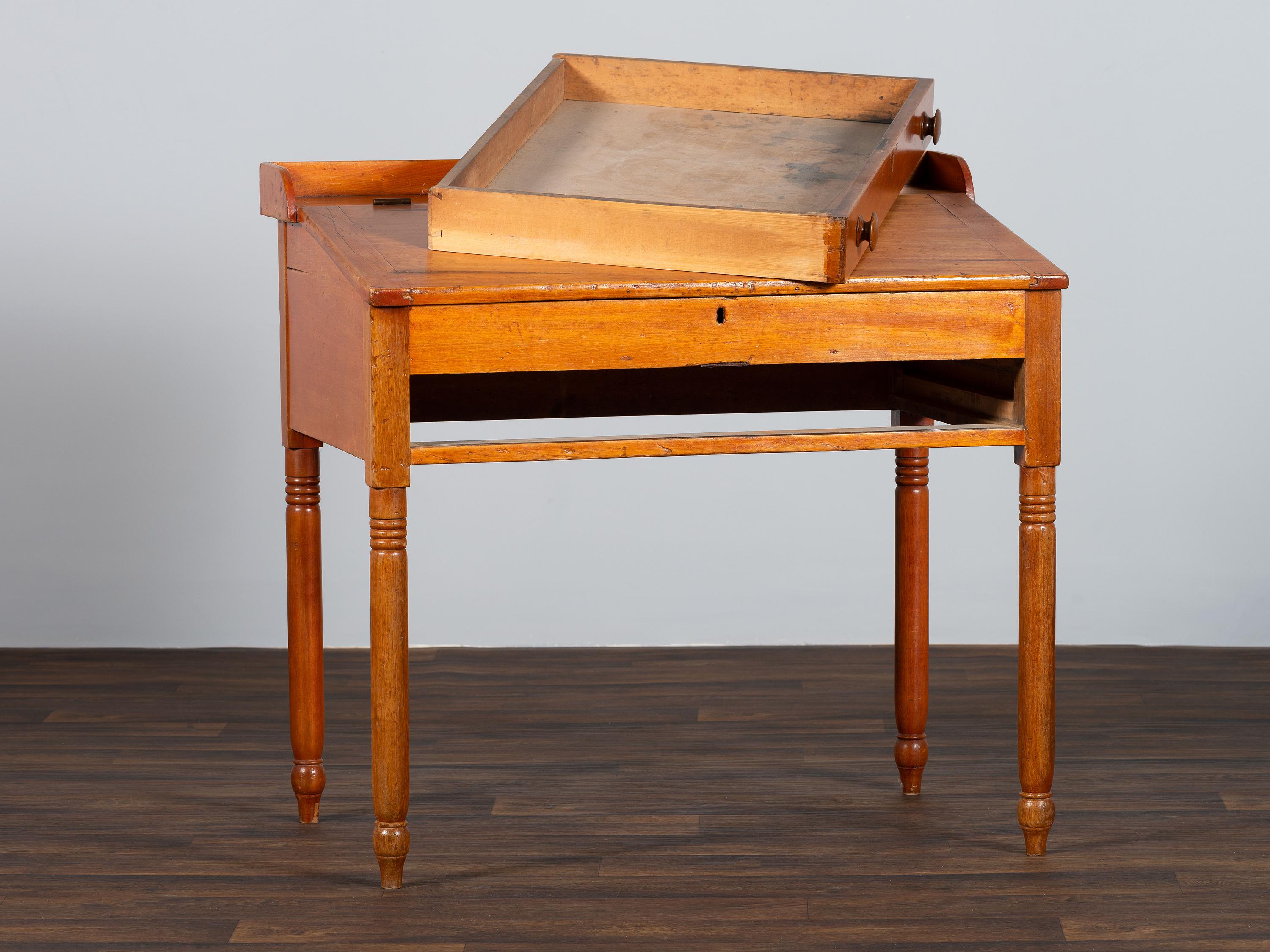 A Late Federal Red-Stained Pine One-Drawer Slant-Lid Schoolmaster's Desk