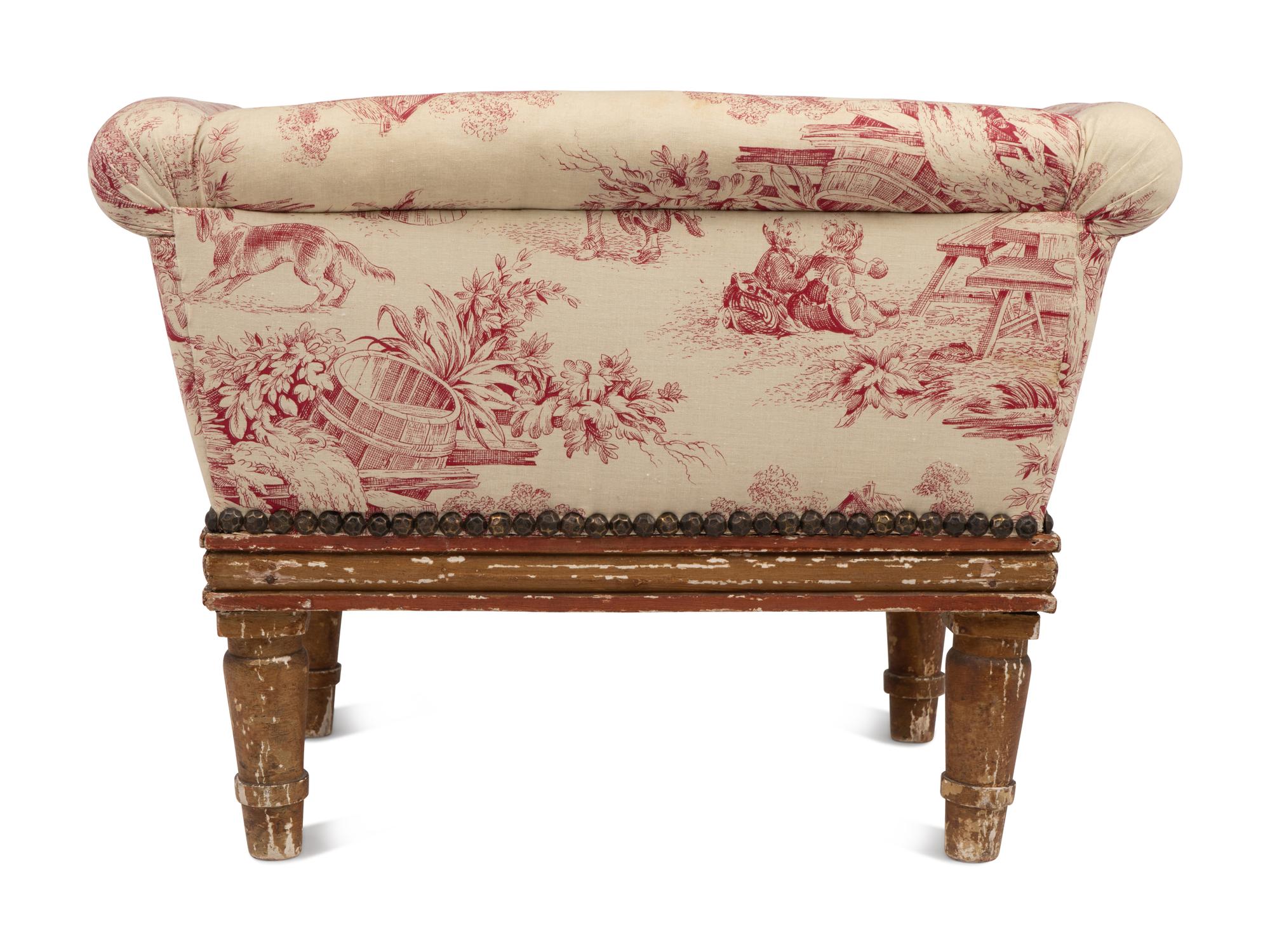 A Continental Painted and Gilt Pet Bed