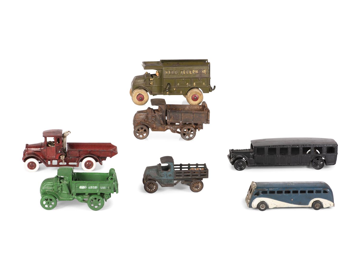 Seven Painted Cast Iron Toy Vehicles