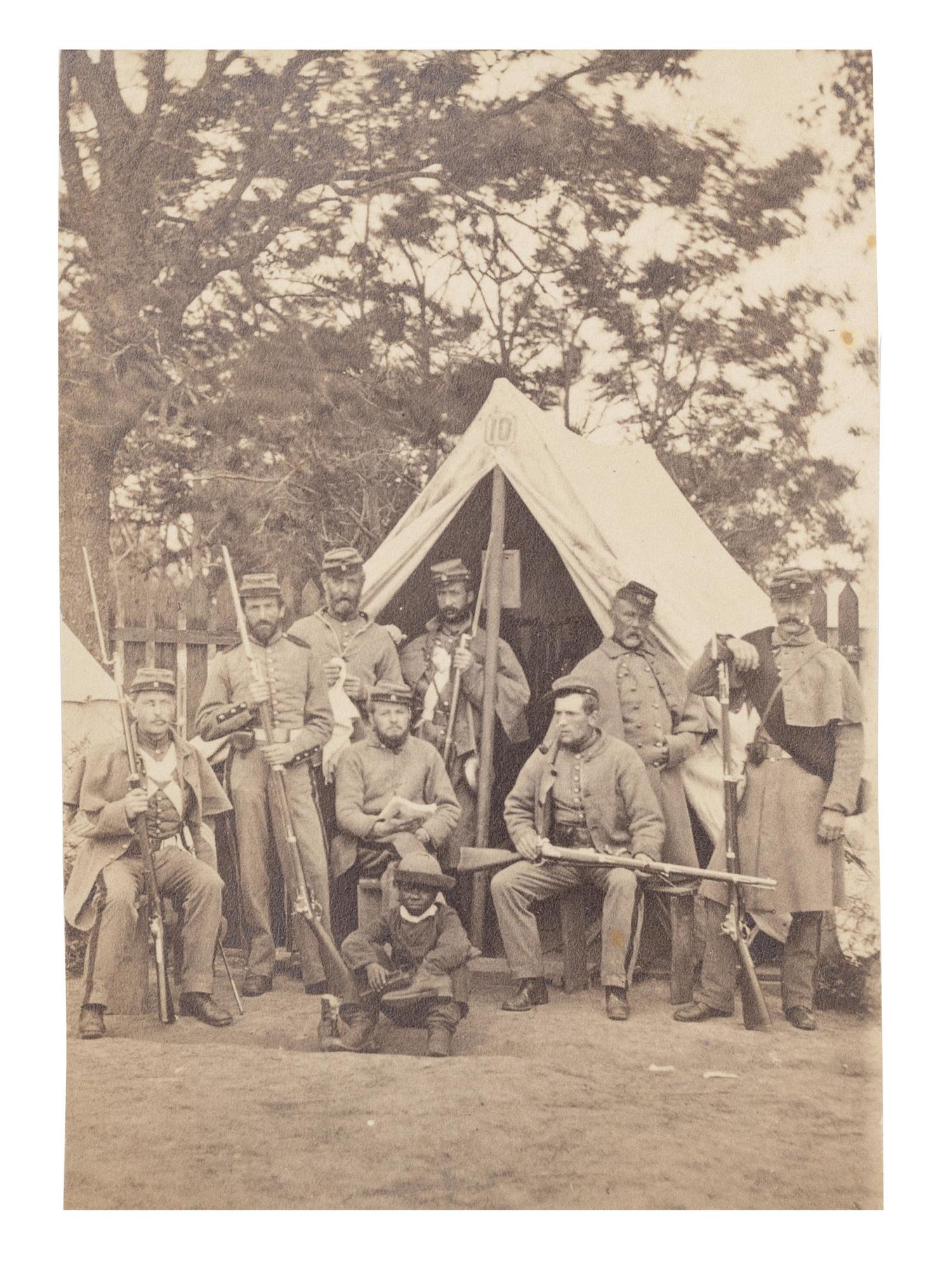 [CIVIL WAR]. 2 photographs of the 7th New York State Militia at Camp Cameron, incl. African American camp servants. Washington, 1861.
