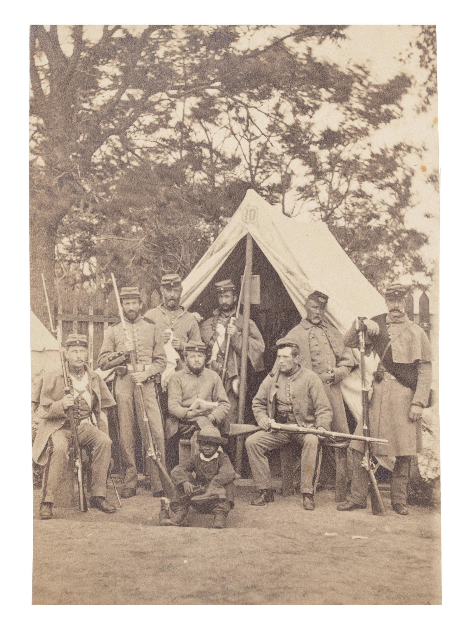 [CIVIL WAR]. 2 photographs of the 7th New York State Militia at Camp Cameron, incl. African American camp servants. Washington, 1861.