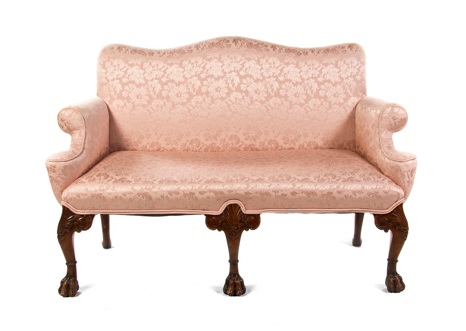 A George II Walnut Settee, Width 56 inches.