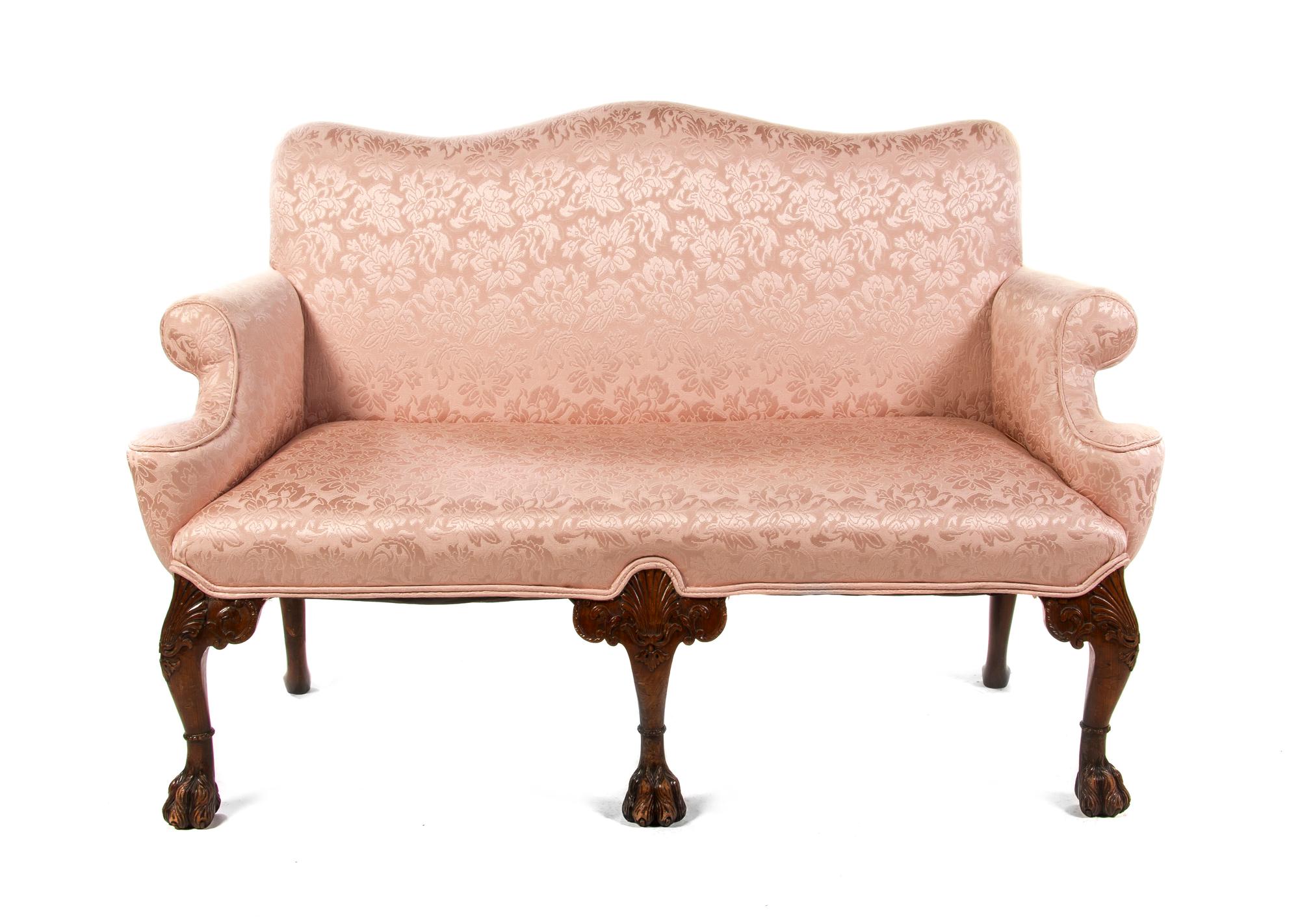 A George II Walnut Settee, Width 56 inches.
