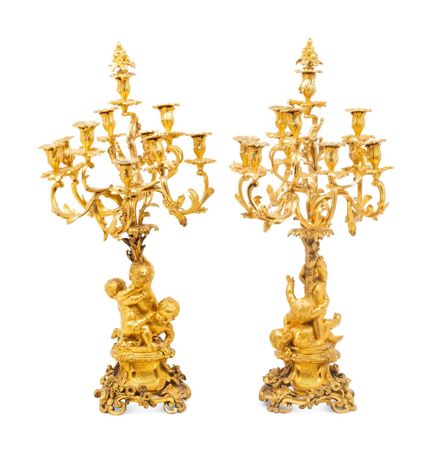 A Pair of Louis XV Style Gilt Bronze Figural Ten-Light Candelabra