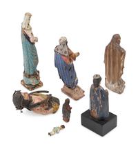 Seven Continental Carved and Polychromed Santos Figures