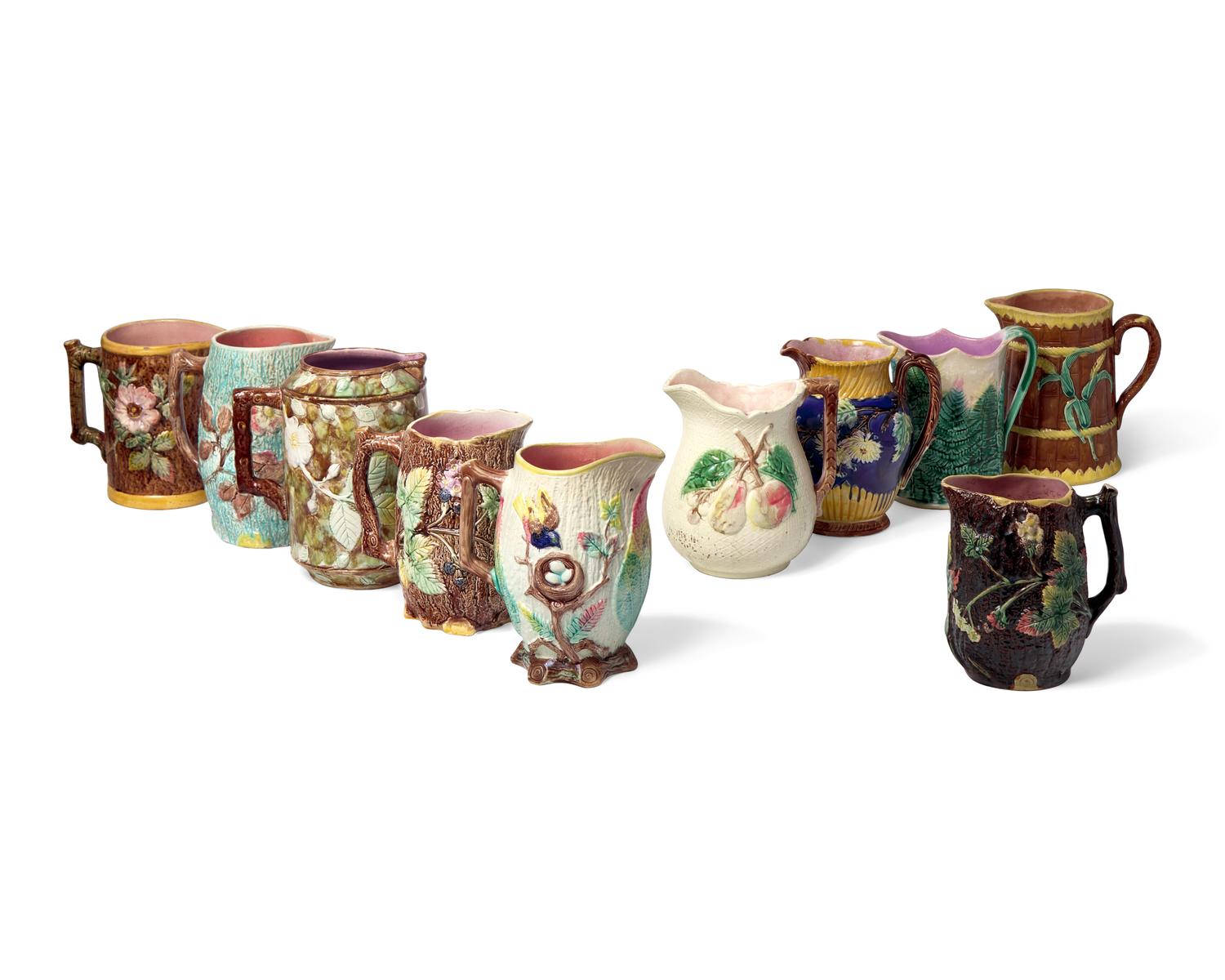 A Collection of Ten Large Majolica Pitchers